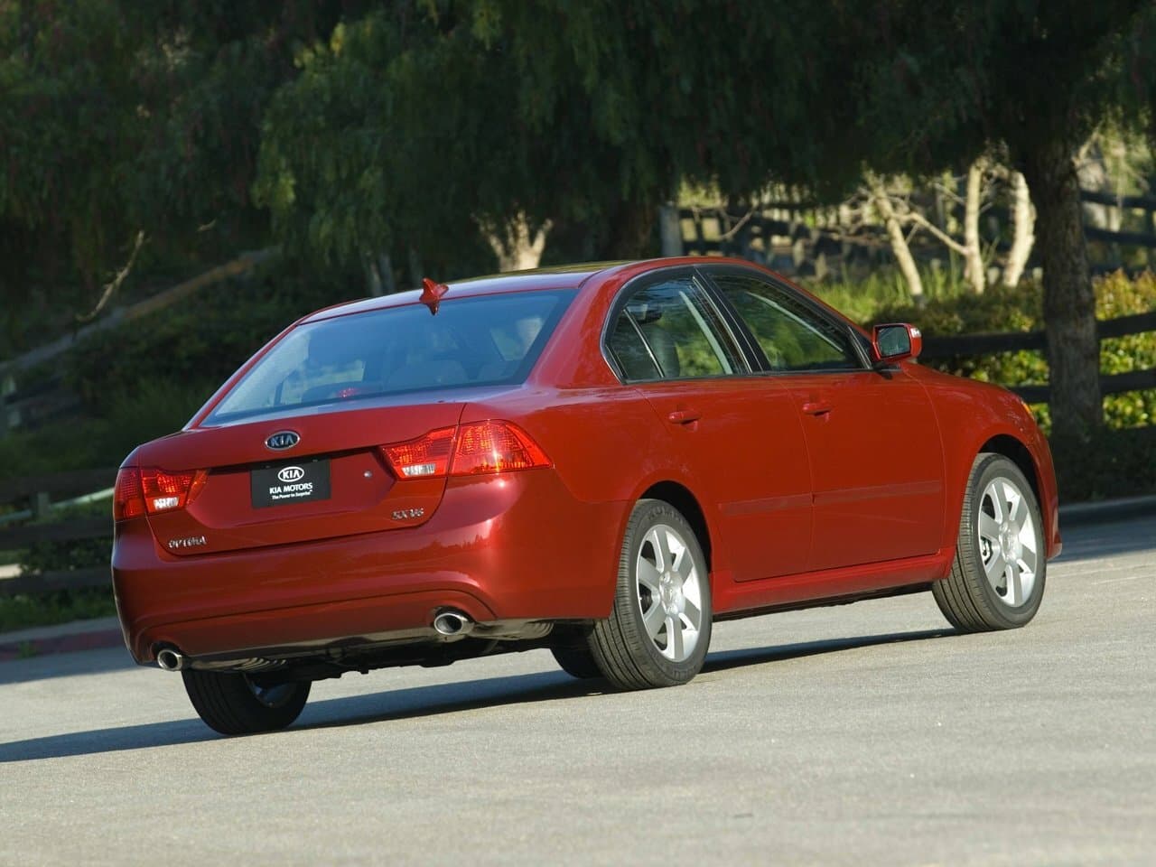 Kia Optima II Рестайлинг Седан, фото 2